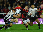 GLOUCESTER, ENGLAND - NOVEMBER 14:  Gloucester centre Henry Trinder makes a break during the European Rugby Challenge Cup match between Gloucester and Zebra at Kingsholm Stadium on November 14, 2015 in Gloucester, England.  (Photo by Stu Forster/Getty Images)